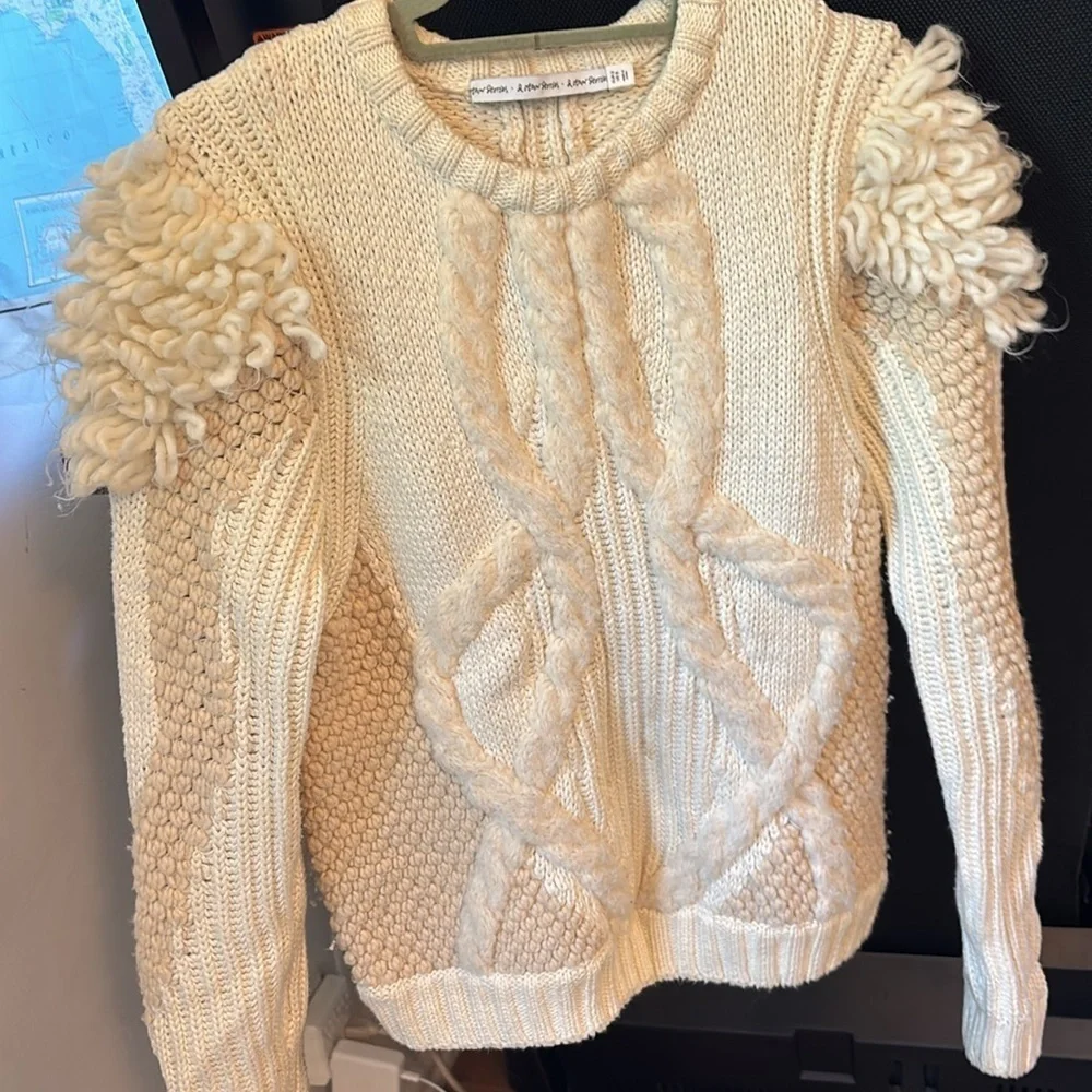 Elegant Cream Sweater with Textured Sleeves